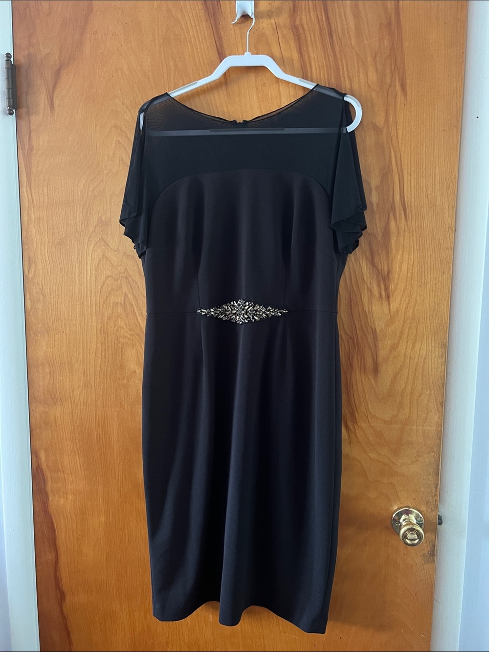 Elegant Black Dress with Embellished Waist